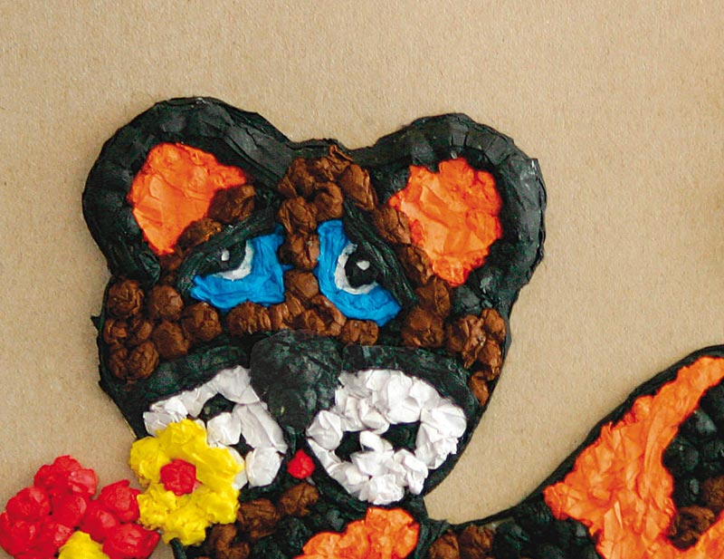 Realizar un pequeño tigre con bolas de papel de seda de colores | Canson